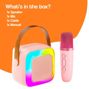 Family Fun Karaoke Machine with wireless speaker, pink microphone, and colorful LED lights for kids aged 3+