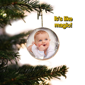 3D holographic video memory ball glowing on holiday table with Christmas tree background