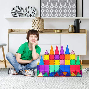 Colorful transparent magnetic building tiles arranged in a 3D structure toy set for creative play