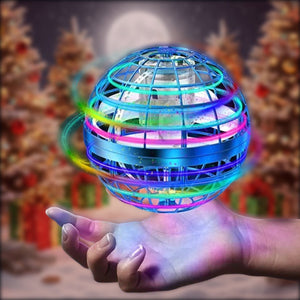 Galaxy Lights Flying Magic Orb glowing with colorful LED lights above hand, festive Christmas background