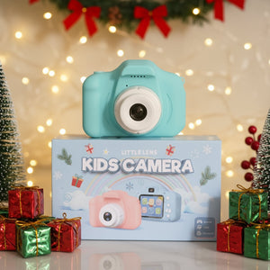 LittleLens Kids Camera in blue with Christmas-themed packaging and gift boxes on festive background