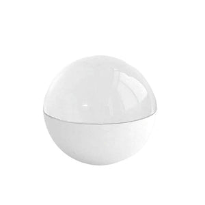 3D holographic video memory ball glowing on wooden surface with Christmas decorations behind