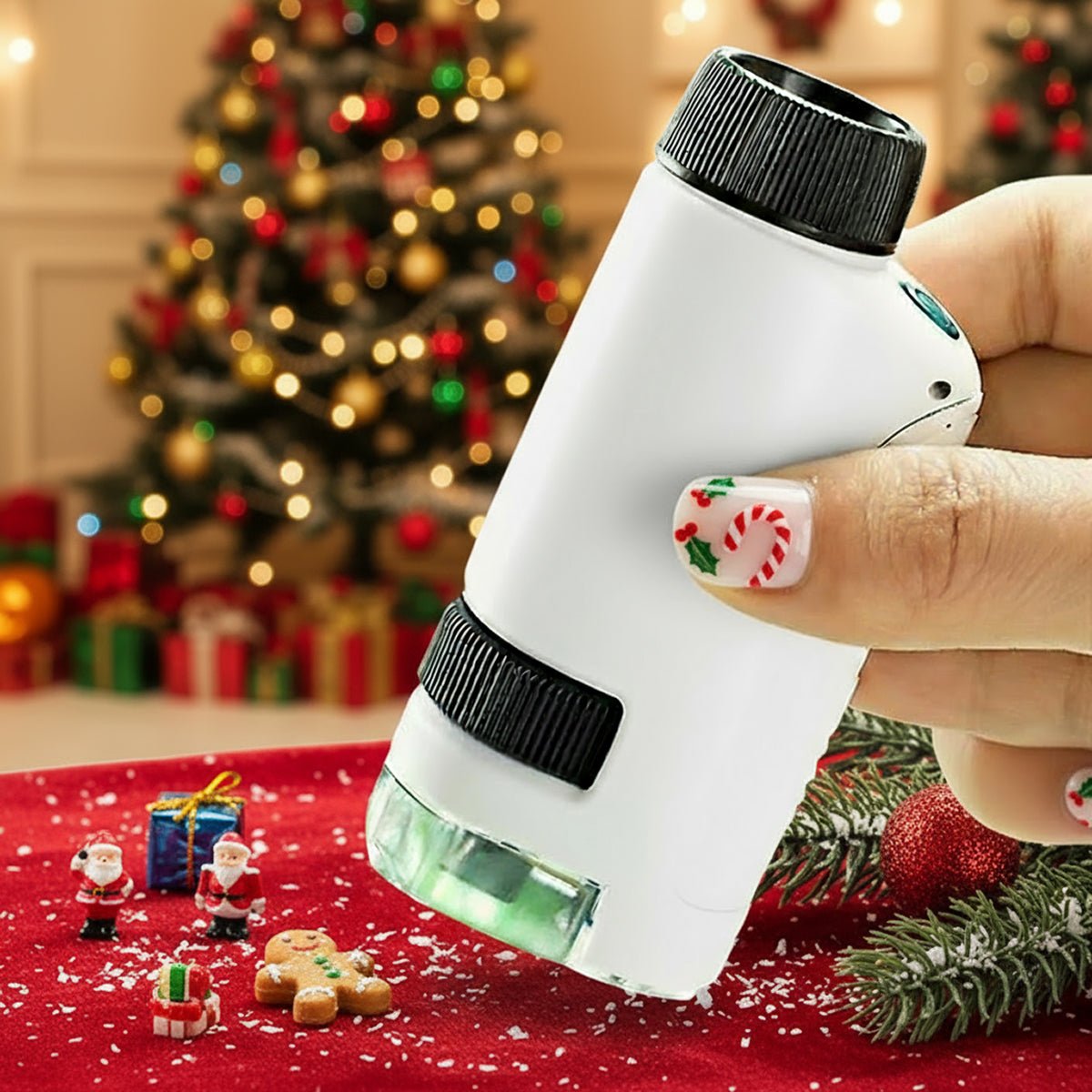 The Original Miniscope™ handheld magnifier with Christmas decorations and tree background