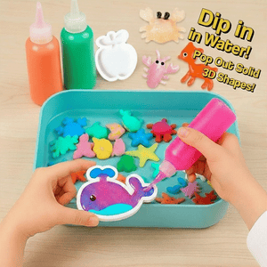 Child playing with Squishy Friends Magic Gel kit, squeezing pink gel into whale mold to create colorful 3D sea creature shapes in water tray